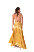 Arriendo de Vestido largo dorado de seda escote en V