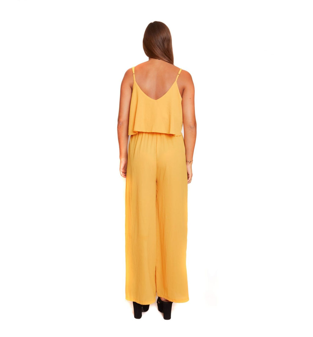 Arriendo de Enterito mostaza con nudo adelante talla L