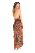 Arriendo de Vestido largo café con naranjo y otros colores espalda descubierta amarre al cuello