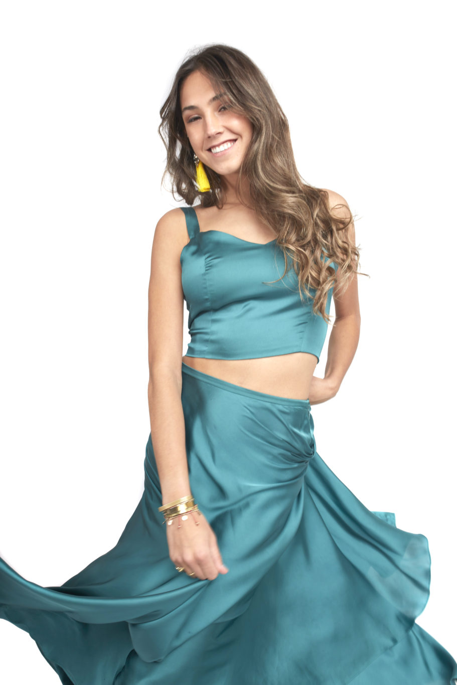 Arriendo de Conjunto de dos piezas, pollera esmeralda de seda y top con botones forrados en espalda
