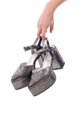 Arriendo de Zapatos plateados con punta leandra