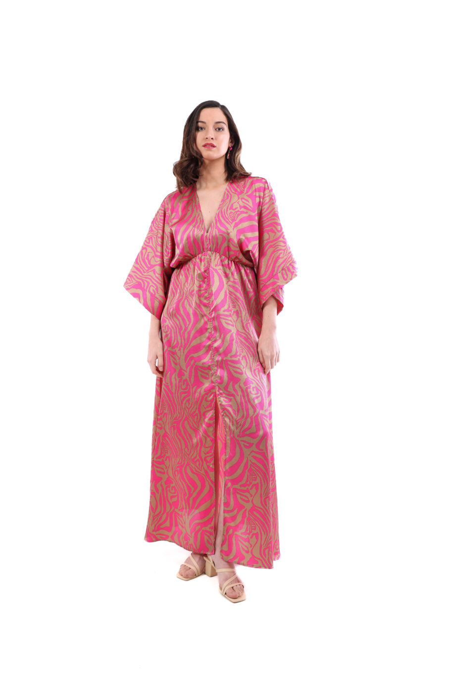 Arriendo de Vestido largo estampado fucsia y café claro con mangas anchas, elástico en cintura, y tajo al medio