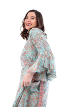 Arriendo de Vestido largo hippie con mangas celeste con estampado de flores salmon y dorado