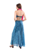 Arriendo de Vestido largo azul con estampado de círculos calipso, bordados dorados y corte a los costados