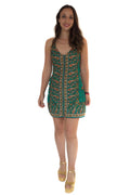Arriendo de Vestido corto verde con aplicaciones de mostacillas y borados