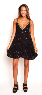 Vestido negro corto con lentejuelas doradas free people