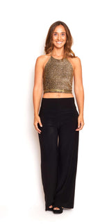 Conjunto top dorado amarre espalda y pantalón negro