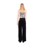 Arriendo de Crop top plateado brillante con pantalón negro