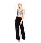 Arriendo de Crop top plateado brillante con pantalón negro