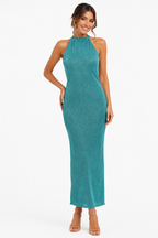 Arriendo de vestido tejido celeste con brillos largo