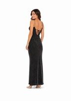 Arriendo de vestido largo negro con brillos dorados