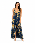 Arriendo de Vestido largo azul con flores amarillas y vuelo adelante
