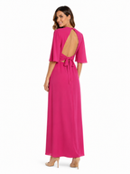 Arriendo de Vestido largo fucsia de gasa con mangas