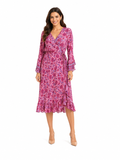 Arriendo de Vestido largo hippie con mangas fucsia con estampado de flores rosadas y moradas