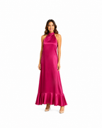 Arriendo de Vestido largo de seda fucsia cuello halter con vuelos abajo y elastizado en espalda