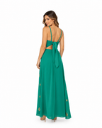 Arriendo de conjunto verde largo con peto halter y brillos en falda
