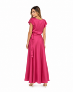 Arriendo de conjunto largo fucsia con vuelos en mangas
