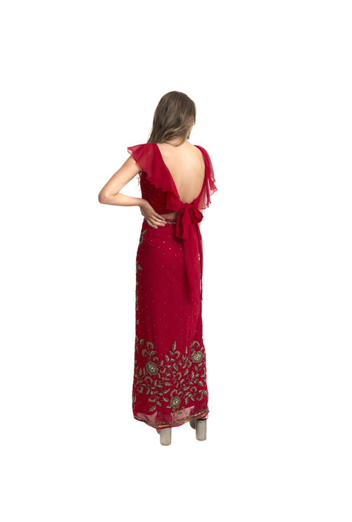 Arriendo de Conjunto Roca top y pollera rojo con mostacillas