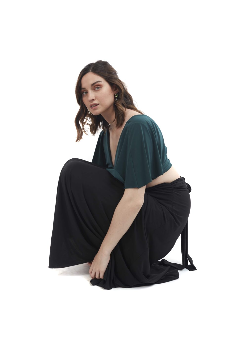Arriendo de Conjunto lycra top verde oscuro manga angel con pollera negra