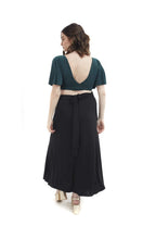 Arriendo de Conjunto lycra top verde oscuro manga angel con pollera negra