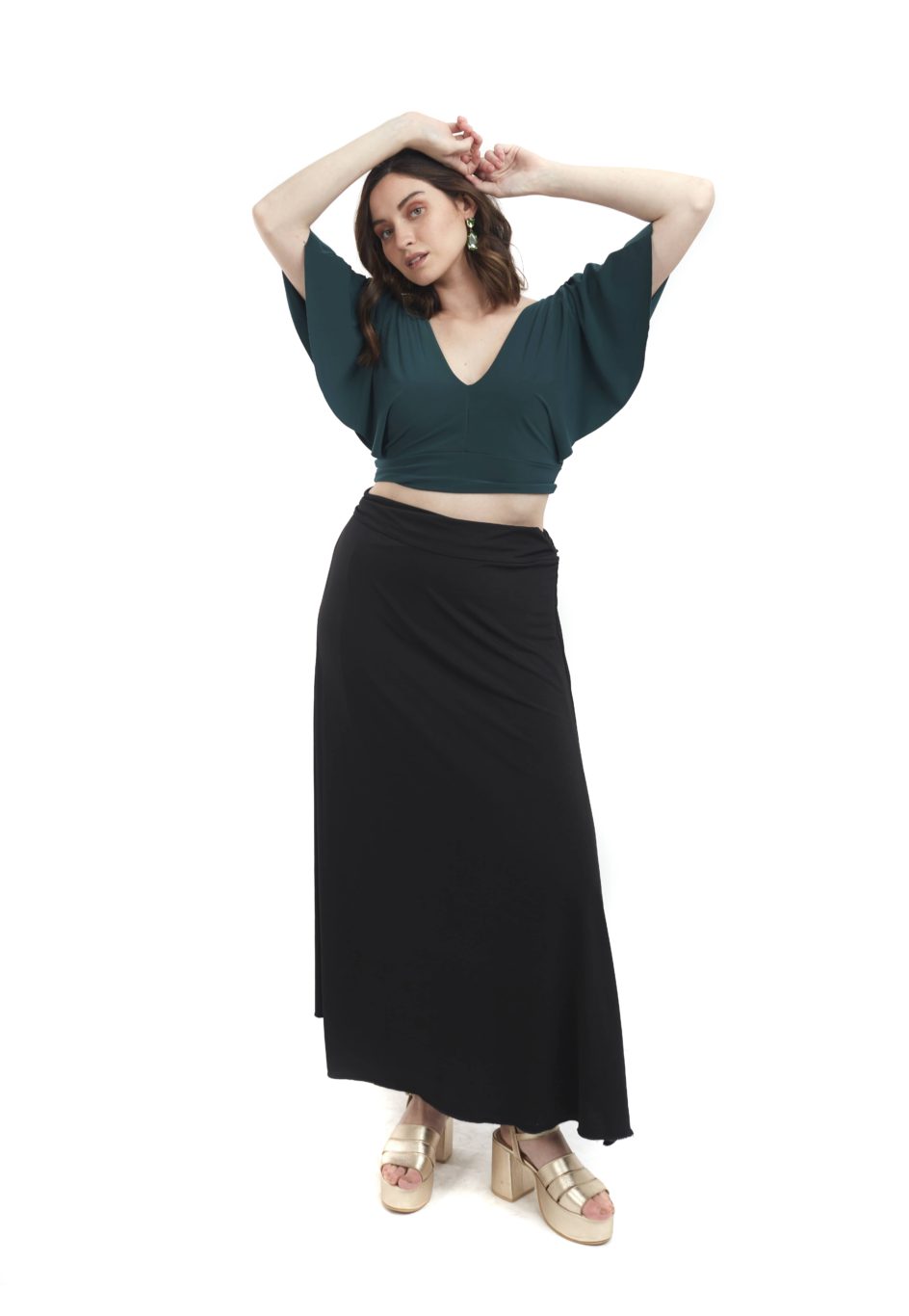 Arriendo de Conjunto lycra top verde oscuro manga angel con pollera negra