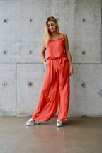 Arriendo de Conjunto naranjo pantalón y polera de seda