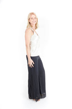 Arriendo de Polera plateada seda con pantalón negro
