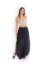 Arriendo de Conjunto top dorado con pollera negra con tranparencia