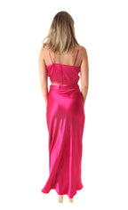 Arriendo de Conjunto fucsia crop top tiritas y pollera