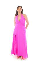 Arriendo de Vestido fucsia fosforescente largo elasticado con escote en v, tajo adelante y amarre en espalda