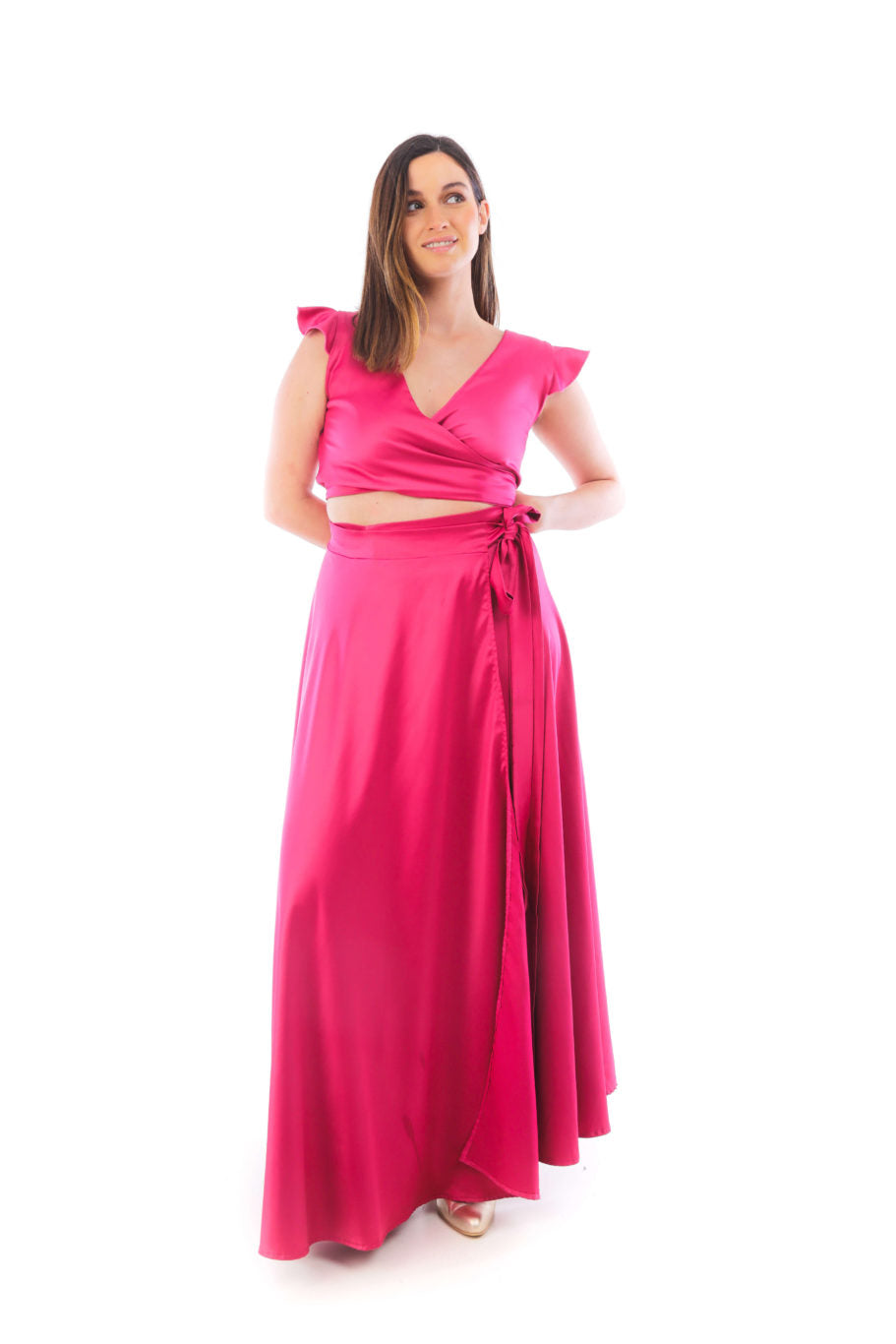 Arriendo de Conjunto fucsia top y pollera ajustable