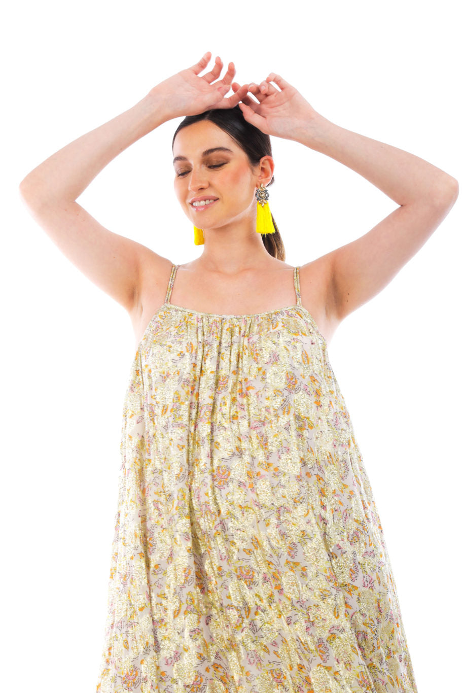 Aros amarillos con flecos en venta