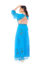 Arriendo de Vestido calipso con bordados de mostacilla dorados