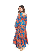 Arriendo de Vestido Cocoota largo naranjo con azul estampado flores