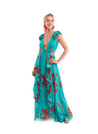 Arriendo de Vestido largo Luxxell vuelos mangas color turquesa con flores rojas
