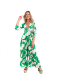 Arriendo de Vestido verde con flores blancas escote en V con malla