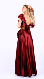 Conjunto burdeo top con vuelos y pollera ajustable