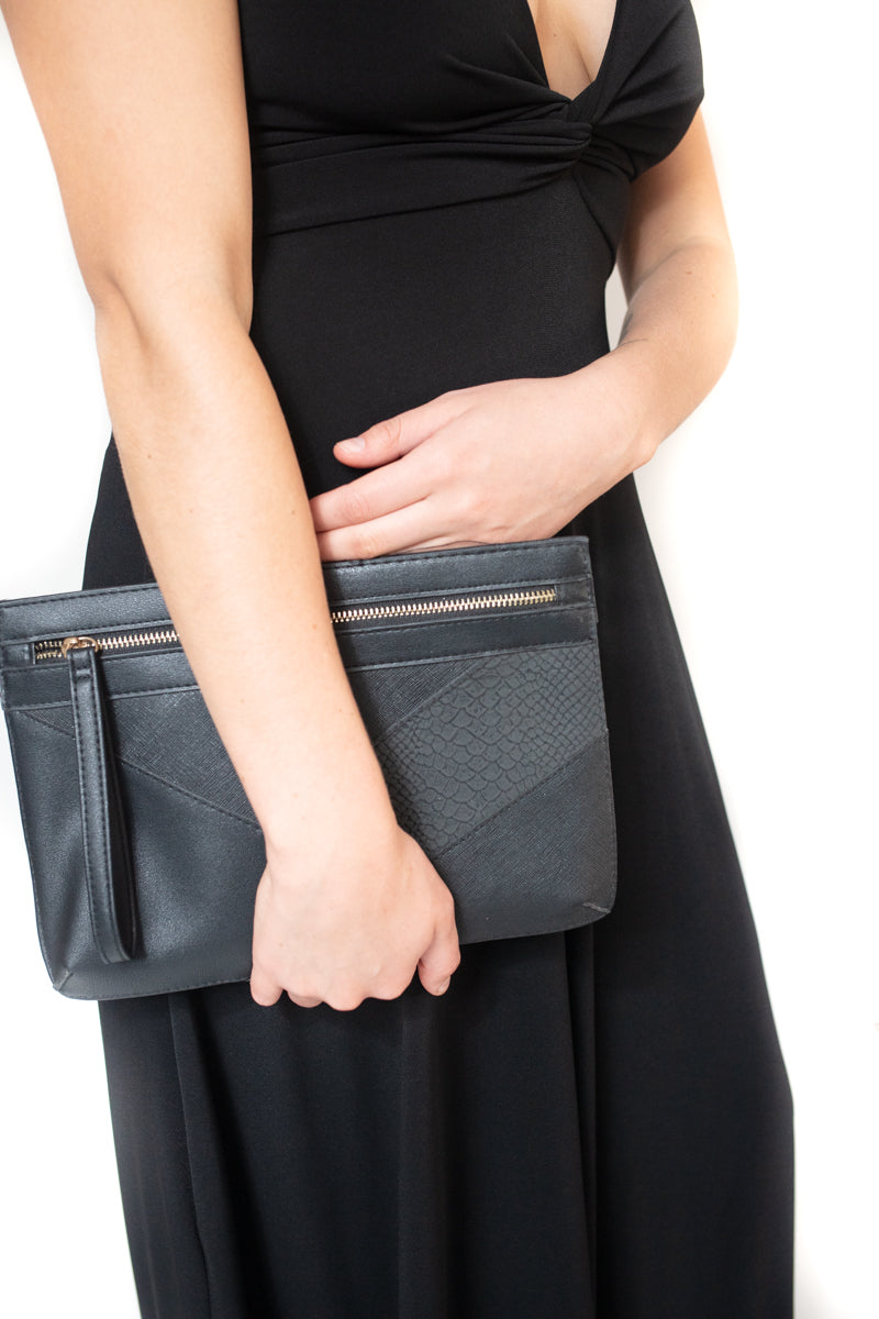 Arriendo de Arriendo de cartera sobre negro con detalles dorados