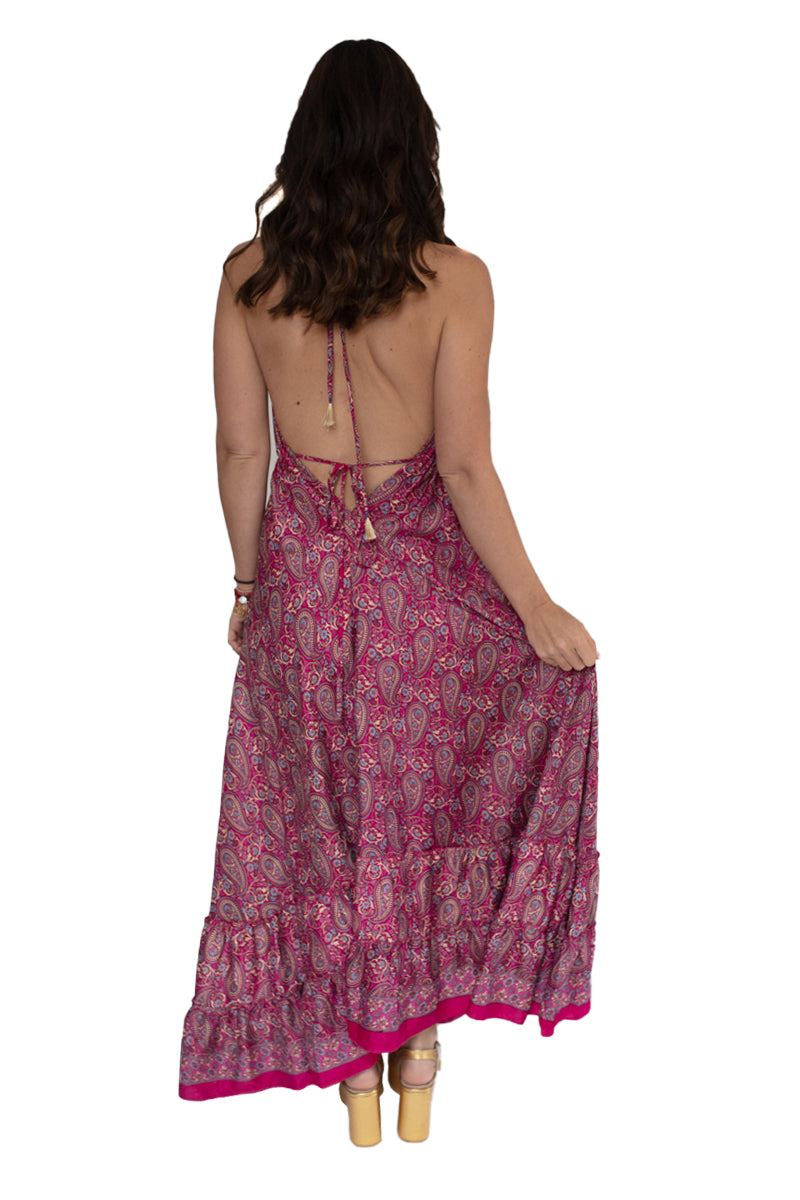 Arriendo de Vestido largo hippie morado con fucsia y flores