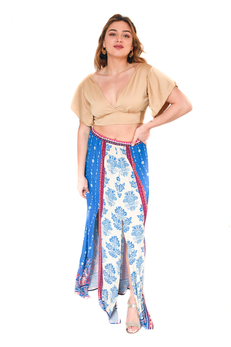 Arriendo de Conjunto crop top dorado con pollera colorida