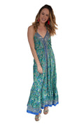 Arriendo de Vestido largo celeste con flores esplada abierta