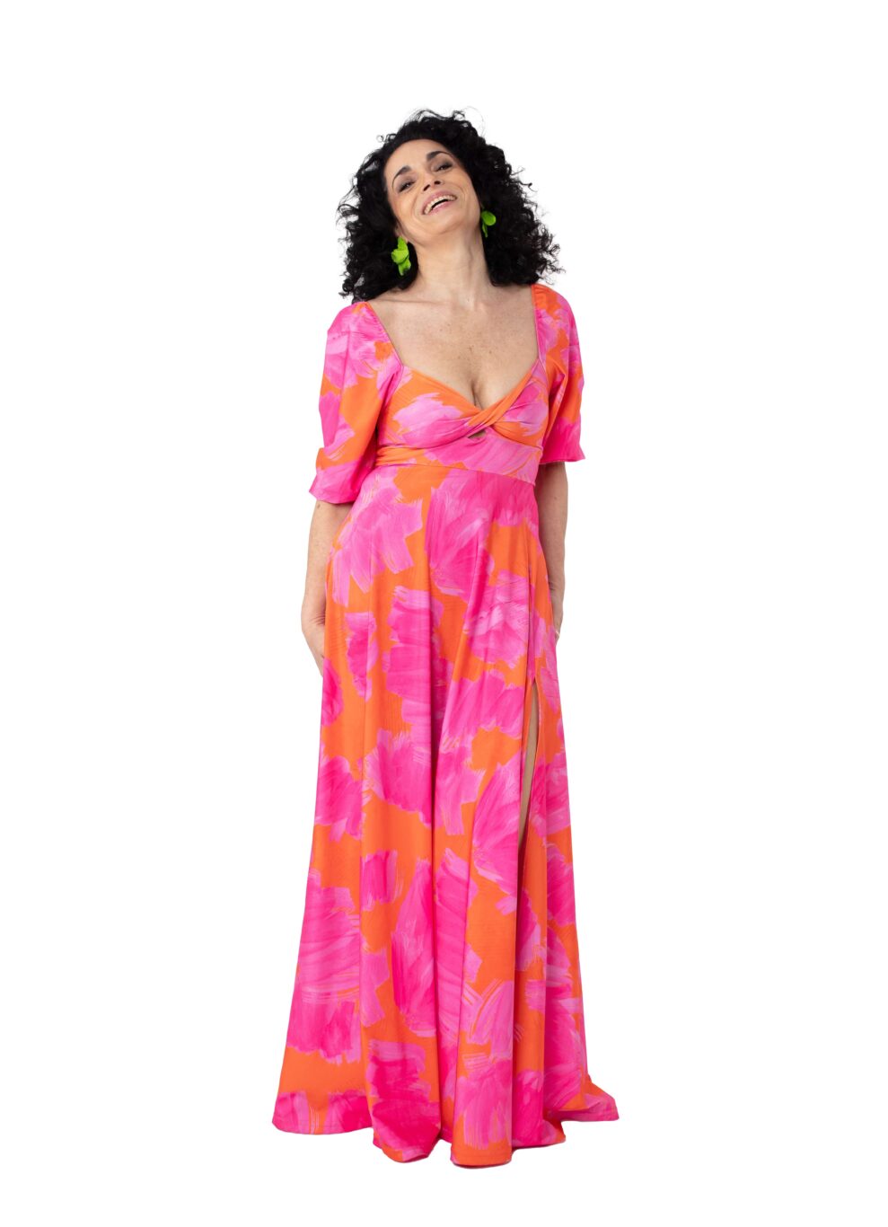 Arriendo de Vestido largo estampado fucsia con naranjo de lycra con mangas