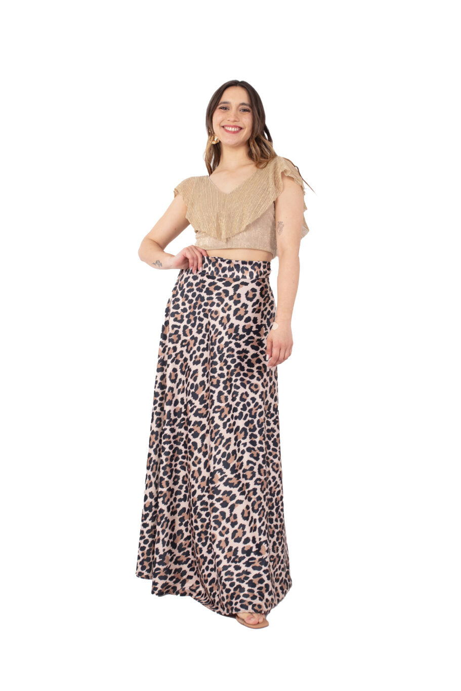 Arriendo de Conjunto de dos piezas, top dorado con brillos y pollera animal print envolvente de seda