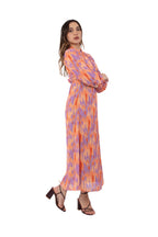 Arriendo de Vestido largo con manga larga naranjo con estampado lila con botones de gasa