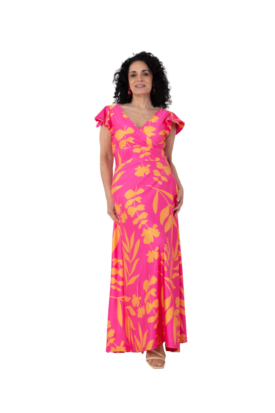Arriendo de Vestido largo de lycra fucsia con estampado de flores y manga corta