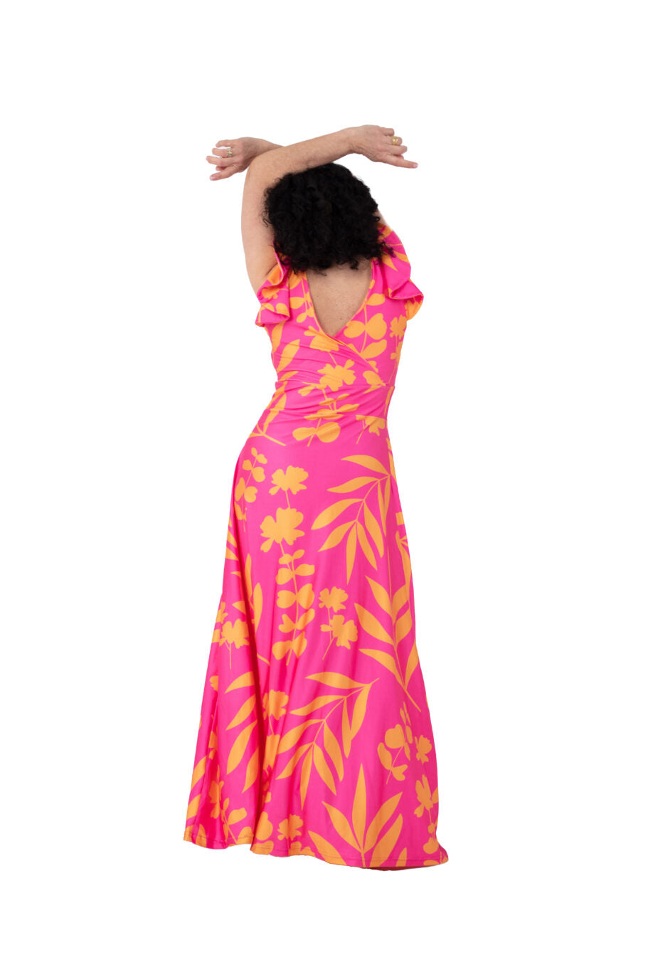 Arriendo de Vestido largo de lycra fucsia con estampado de flores y manga corta