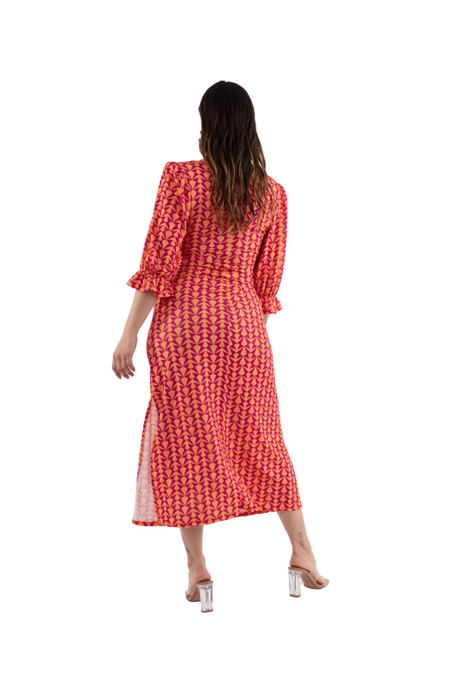 Arriendo de Vestido largo cut out en abdomen con hombreras naranjo com morado