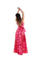 Arriendo de Conjunto de dos piezas, top y pollera ajustables con estampado fucsia, naranjo y rosado