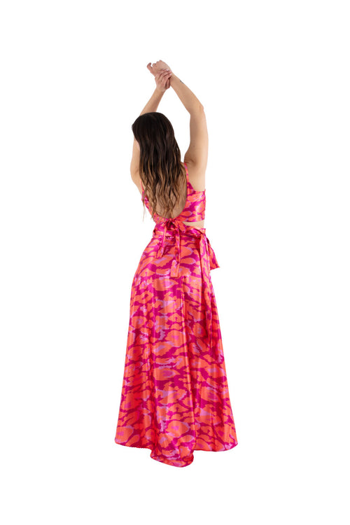 Arriendo de Conjunto de dos piezas, top y pollera ajustables con estampado fucsia, naranjo y rosado